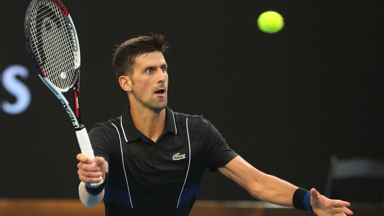 MELBOURNE, AUSTRALIA - JANUARY 20: Novak Djokovic of Serbia plays a forehand in his third round match against Albert Ramos-Vinolas of Spain on day six of the 2018 Australian Open at Melbourne Park on January 20, 2018 in Melbourne, Australia.