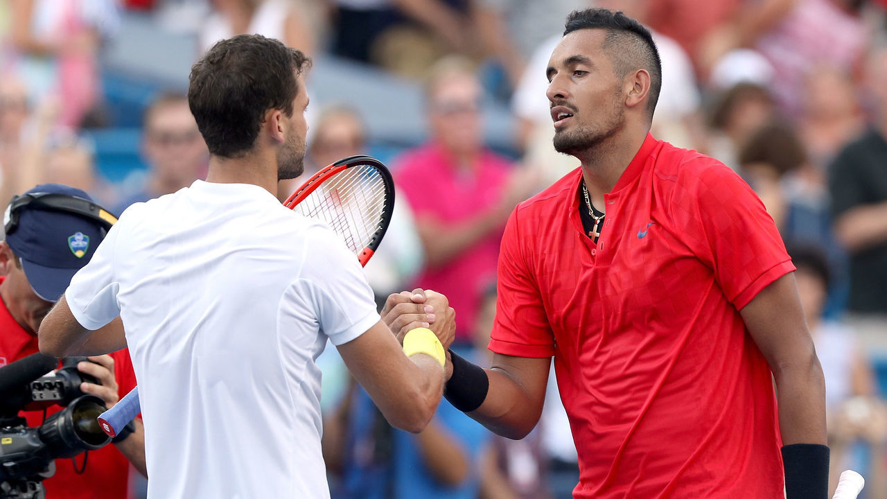 MASON, OH - AUGUST 20: Grigor Dimitrov of Bulgaria is congratulated by Nick Kyrgios of Australia after their match during the men's final on day 9 of the Western & Southern Open at the Lindner Family Tennis Center on August 20, 2017 in Mason, Ohio.