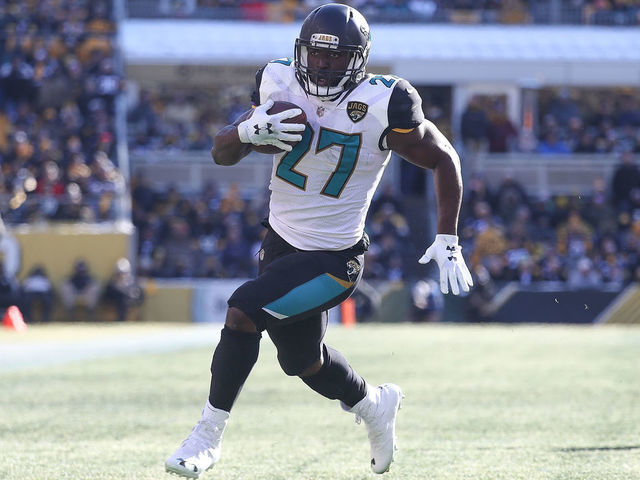 PITTSBURGH, PA - JANUARY 14: Leonard Fournette #27 of the Jacksonville Jaguars runs for a touchdown against the Pittsburgh Steelers during the first half of the AFC Divisional Playoff game at Heinz Field on January 14, 2018 in Pittsburgh, Pennsylvania.