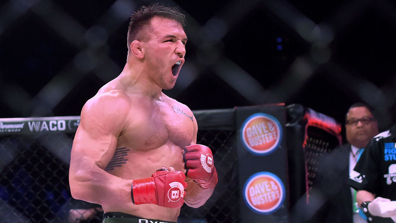 INGLEWOOD, CA - JANUARY 20: Michael Chandler Jr (red gloves) celebrates after defeating Goiti Yamauchi (blue gloves) in their Lightweight fight at Bellator 192 at The Forum on January 20, 2018 in Inglewood, California. Michael Chandler Jr won by unanimous decision.