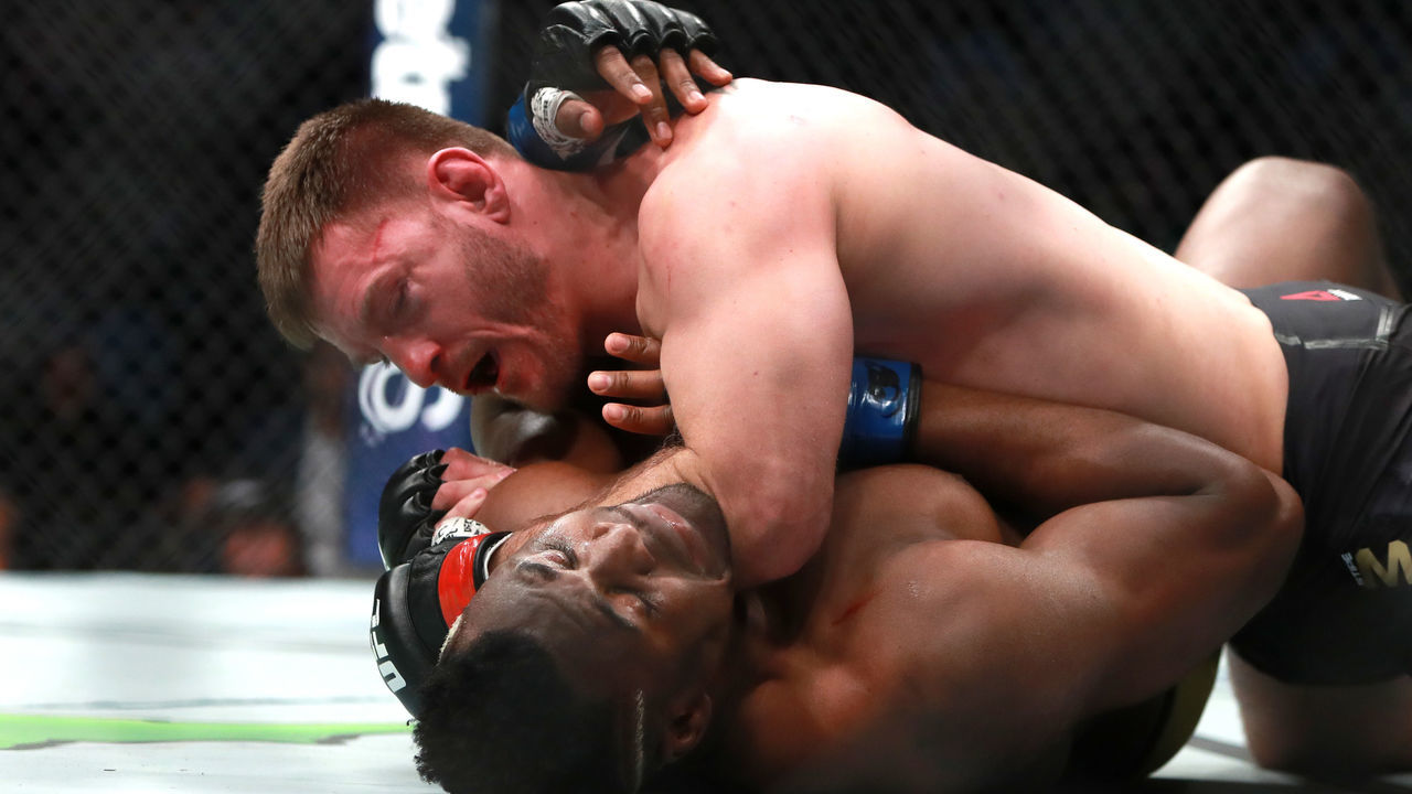 BOSTON, MA - JANUARY 20: Stipe Miocic grapples with Francis Ngannou in their Heavyweight Championship fight during UFC 220 at TD Garden on January 20, 2018 in Boston, Massachusetts.