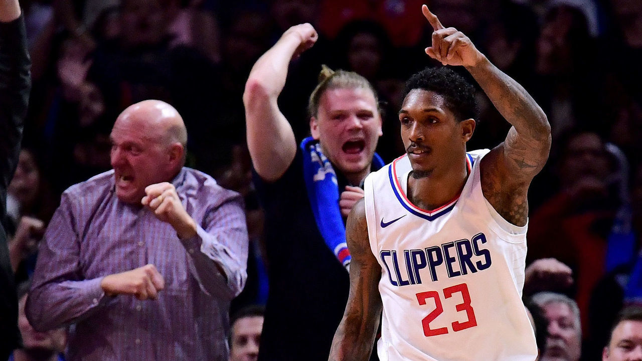 LOS ANGELES, CA - DECEMBER 20: Lou Williams #23 of the LA Clippers celebrates his last second dunk to end the third quarter against the Phoenix Suns during a 108-95 Clipper win at Staples Center on December 20, 2017 in Los Angeles, California.