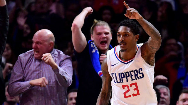 LOS ANGELES, CA - DECEMBER 20: Lou Williams #23 of the LA Clippers celebrates his last second dunk to end the third quarter against the Phoenix Suns during a 108-95 Clipper win at Staples Center on December 20, 2017 in Los Angeles, California.