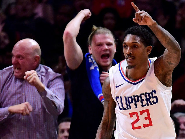 LOS ANGELES, CA - DECEMBER 20: Lou Williams #23 of the LA Clippers celebrates his last second dunk to end the third quarter against the Phoenix Suns during a 108-95 Clipper win at Staples Center on December 20, 2017 in Los Angeles, California.