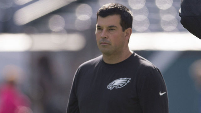 PHILADELPHIA, PA - OCTOBER 11: Quarterbacks coach Ryan Day looks on as Sam Bradford #7 of the Philadelphia Eagles warms up prior to the game against the New Orleans Saints on October 11, 2015 at Lincoln Financial field in Philadelphia, Pennsylvania.