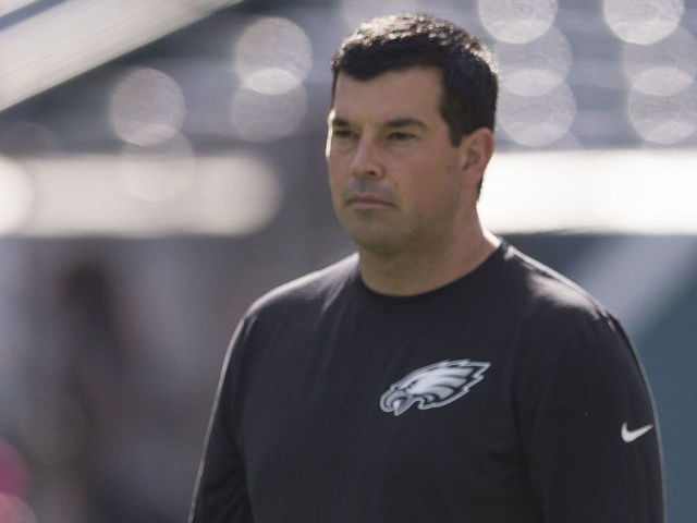 PHILADELPHIA, PA - OCTOBER 11: Quarterbacks coach Ryan Day looks on as Sam Bradford #7 of the Philadelphia Eagles warms up prior to the game against the New Orleans Saints on October 11, 2015 at Lincoln Financial field in Philadelphia, Pennsylvania.