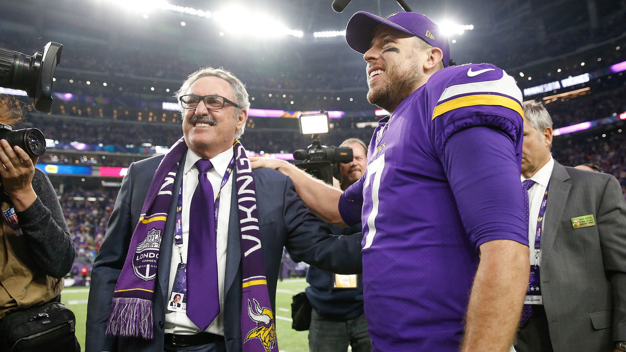 MINNEAPOLIS, MN - JANUARY 14: Case Keenum #7 of the Minnesota Vikings celebrates with owner Zygi Wilf after defeating the New Orleans Saints in the NFC Divisional Playoff game at U.S. Bank Stadium on January 14, 2018 in Minneapolis, Minnesota.
