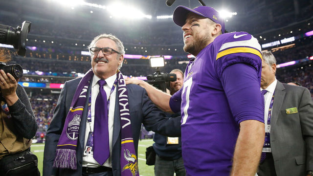 MINNEAPOLIS, MN - JANUARY 14: Case Keenum #7 of the Minnesota Vikings celebrates with owner Zygi Wilf after defeating the New Orleans Saints in the NFC Divisional Playoff game at U.S. Bank Stadium on January 14, 2018 in Minneapolis, Minnesota.
