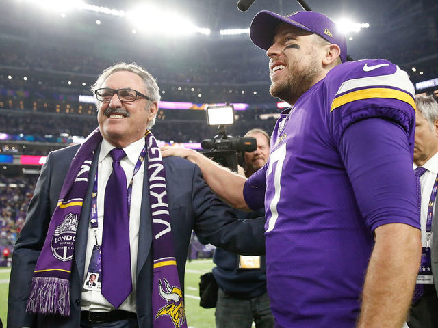 MINNEAPOLIS, MN - JANUARY 14: Case Keenum #7 of the Minnesota Vikings celebrates with owner Zygi Wilf after defeating the New Orleans Saints in the NFC Divisional Playoff game at U.S. Bank Stadium on January 14, 2018 in Minneapolis, Minnesota.