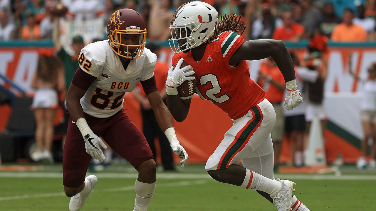 MIAMI GARDENS, FL - SEPTEMBER 02: Malek Young #12 of the Miami Hurricanes returns an interception during a game against the Bethune Cookman Wildcats at Hard Rock Stadium on September 2, 2017 in Miami Gardens, Florida.