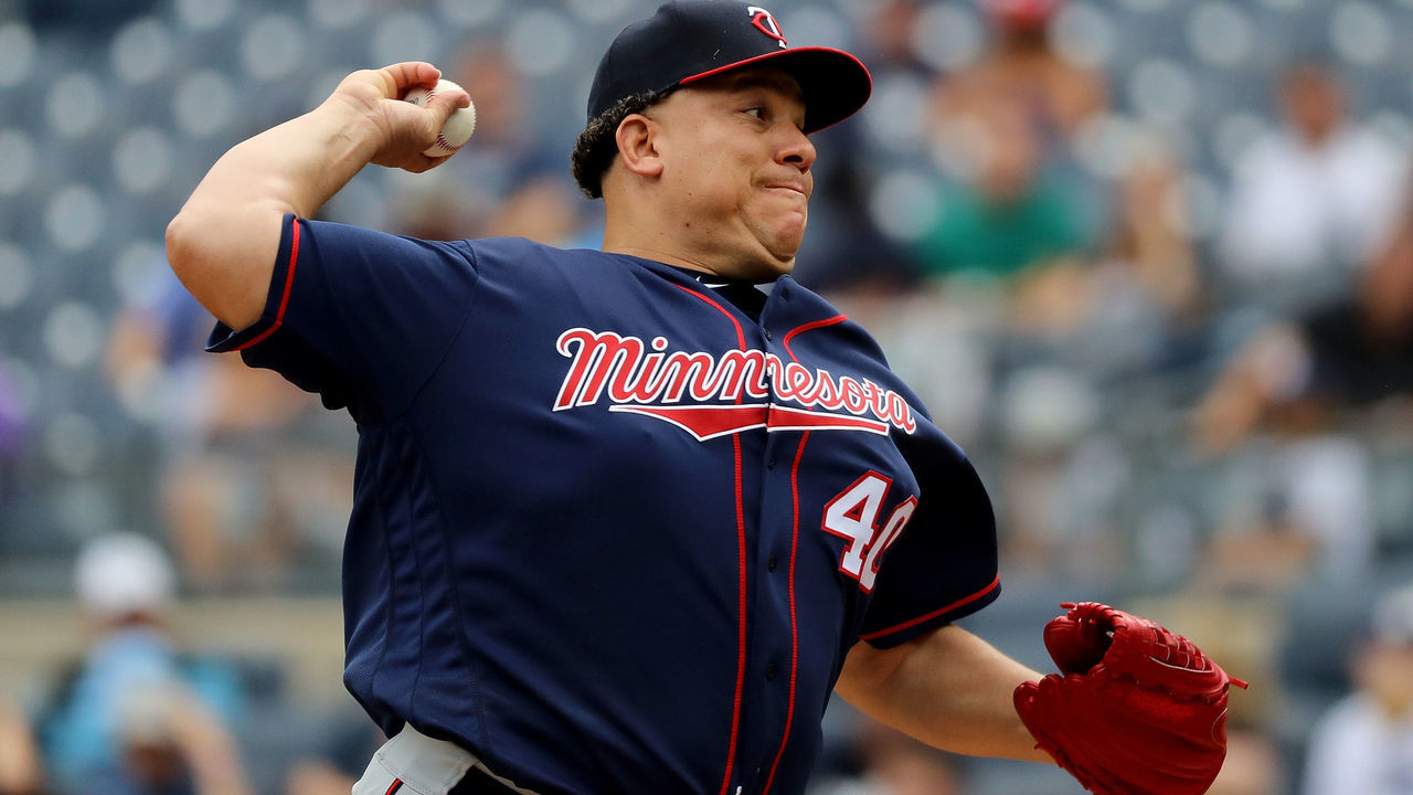 NEW YORK, NY - SEPTEMBER 20: Bartolo Colon #40 of the Minnesota Twins pitches during the first inning of a game against the New York Yankees on September 20, 2017 at Yankee Stadium in the Bronx borough of New York City.
