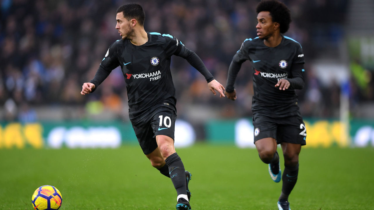 BRIGHTON, ENGLAND - JANUARY 20: Eden Hazard of Chelsea runs with the ball during the Premier League match between Brighton and Hove Albion and Chelsea at Amex Stadium on January 20, 2018 in Brighton, England.