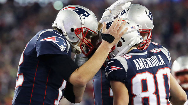 FOXBOROUGH, MA - JANUARY 21: Tom Brady #12 of the New England Patriots celebrates a touchdown with Danny Amendola #80 in the fourth quarter during the AFC Championship Game against the Jacksonville Jaguars at Gillette Stadium on January 21, 2018 in Foxborough, Massachusetts.