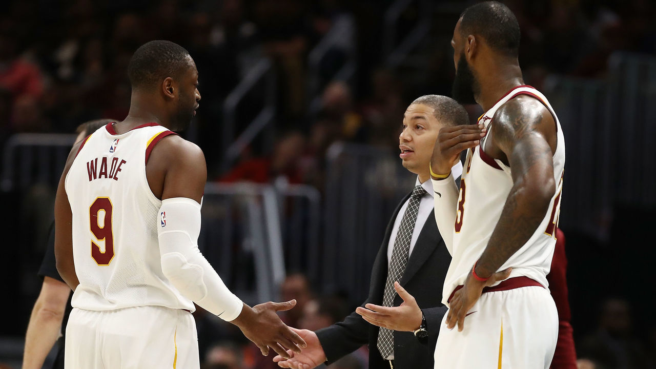 CLEVELAND, OH - NOVEMBER 07: Head coach Tyronn Lue of the Cleveland Cavaliers talks to Dwyane Wade #9 and LeBron James #23 while playing the Milwaukee Bucks at Quicken Loans Arena on November 7, 2017 in Cleveland, Ohio. Cleveland won the game 124-119.