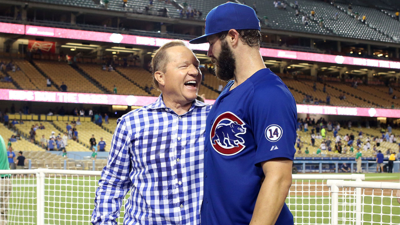 LOS ANGELES, CA - AUGUST 30: Starting pitcher Jake Arrieta #49 of the Chicago Cubsis greeted by agent Scott Boras after pitching a no hitter against the Los Angeles Dodgers at Dodger Stadium on August 30, 2015 in Los Angeles, California. The Cubs won 2-0.