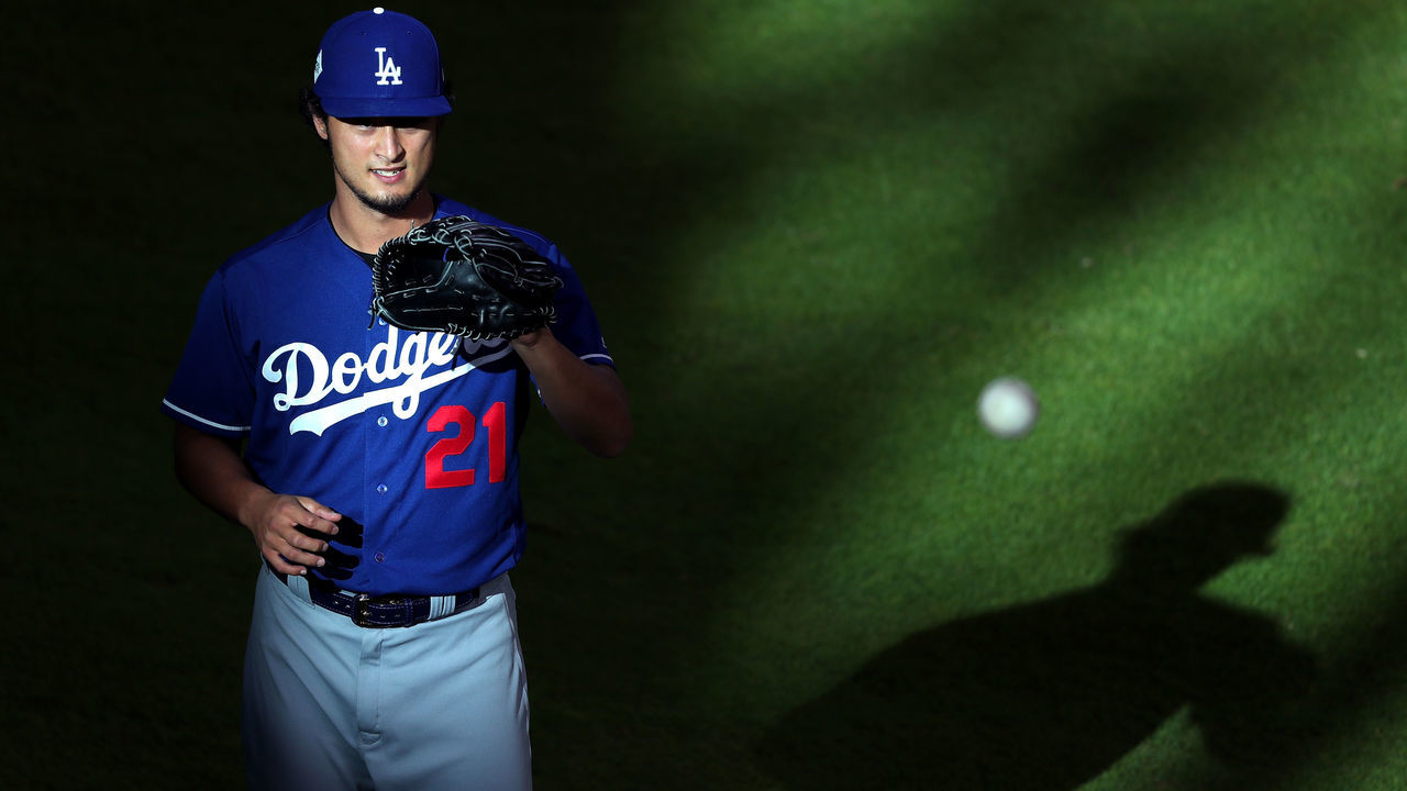 HOUSTON, TX - OCTOBER 29: Yu Darvish #21 of the Los Angeles Dodgers warms up before game five of the 2017 World Series against the Houston Astros at Minute Maid Park on October 29, 2017 in Houston, Texas.