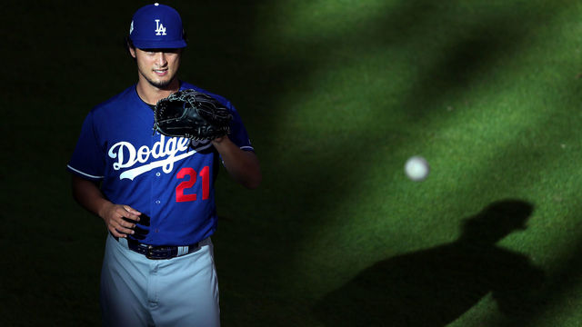 HOUSTON, TX - OCTOBER 29: Yu Darvish #21 of the Los Angeles Dodgers warms up before game five of the 2017 World Series against the Houston Astros at Minute Maid Park on October 29, 2017 in Houston, Texas.