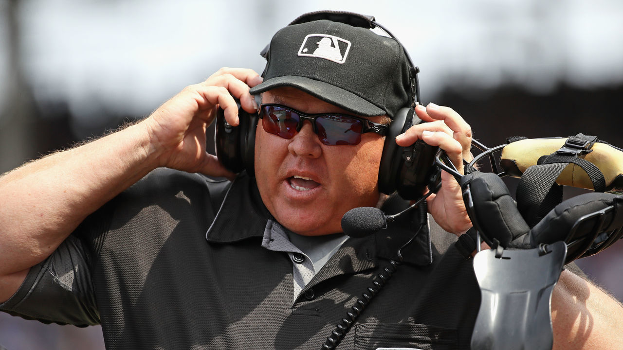 CHICAGO, IL - JULY 05: Home plate umpire and crew chief Fieldin Culbreth #25 waits for a replay ruling during a game bwteen the Chicago Cubs and the Tampa Bay Rays at Wrigley Field on July 5, 2017 in Chicago, Illinois.