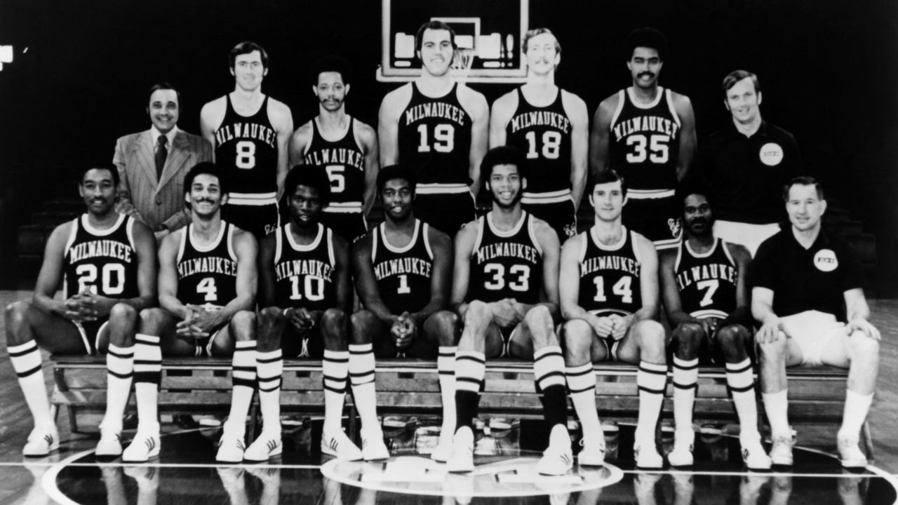 MILWAUKEE, WI - 1971: The 1970-71 NBA Champion Milwaukee Bucks pose for a team portrait in Milwaukee, Wisconsin. Seated from left, Bob Boozer, Greg Smith, Bob Dandridge, Oscar Robertson, Kareem Abdul Jabbar, John McGlocklin, Lucius Allen and Coach Larry Costello. Standing: Trainer Arnie Garber, Jeff Webb, Marvin Winkler, Dick Cunningham, Bob Greacen, McCoy McLemore, Assistant Coach Tom Nissalke. NOTE TO USER: User expressly acknowledges and agrees that, by downloading and or using this photograph, User is consenting to the terms and conditions of the Getty Images License Agreement. Mandatory copyright notice: Copyright NBAE 2002