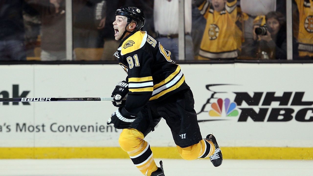 BOSTON - MAY 01: Marc Savard #91 of the Boston Bruins celebrates his game winning goal in the overtime period against the Philadelphia Flyers in Game One of the Eastern Conference Semifinals during the 2010 NHL Stanley Cup Playoffs at TD Garden on May 1, 2010 in Boston, Massachusetts. The Bruins defeated the Flyers 5-4 in overtime.