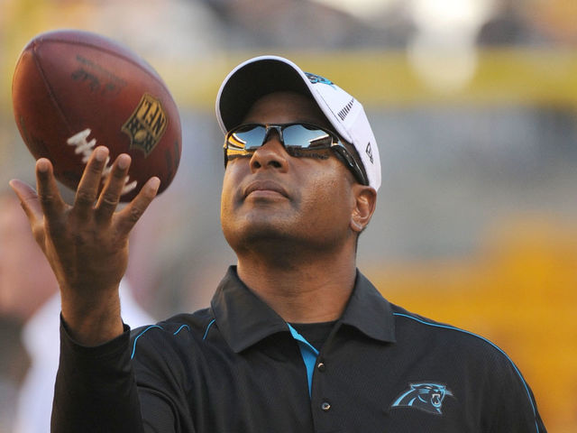 PITTSBURGH, PA - AUGUST 30: Secondary/pass defense coordinator Steve Wilks of the Carolina Panthers tosses a football in the air during pregame warmup before a preseason game against the Pittsburgh Steelers at Heinz Field on August 30, 2012 in Pittsburgh, Pennsylvania. The Steelers defeated the Panthers 17-16.