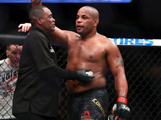 BOSTON, MA - JANUARY 20: Daniel Cormier reacts after his fight against Volkan Oezdemir in their Light Heavyweight Championship fight during UFC 220 at TD Garden on January 20, 2018 in Boston, Massachusetts.