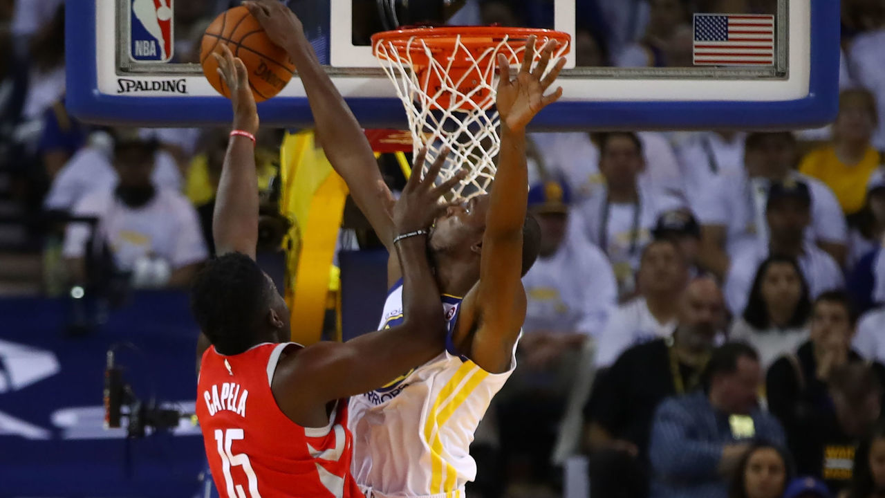 OAKLAND, CA - OCTOBER 17: Kevin Durant #35 of the Golden State Warriors blocks a shot by Clint Capela #15 of the Houston Rockets during their NBA game at ORACLE Arena on October 17, 2017 in Oakland, California.