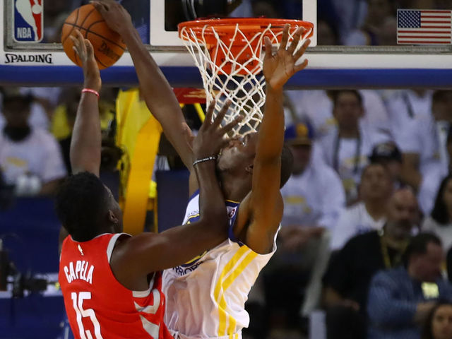 OAKLAND, CA - OCTOBER 17: Kevin Durant #35 of the Golden State Warriors blocks a shot by Clint Capela #15 of the Houston Rockets during their NBA game at ORACLE Arena on October 17, 2017 in Oakland, California.