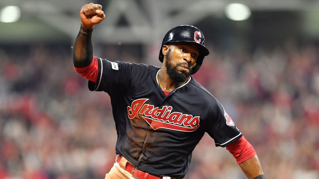CLEVELAND, OH - OCTOBER 06: Austin Jackson #26 runs home to score the winning run on a single by Yan Gomes #7 of the Cleveland Indians to win the game 9 to 8 in the 13th inning during game two of the American League Division Series at Progressive Field on October 6, 2017 in Cleveland, Ohio.