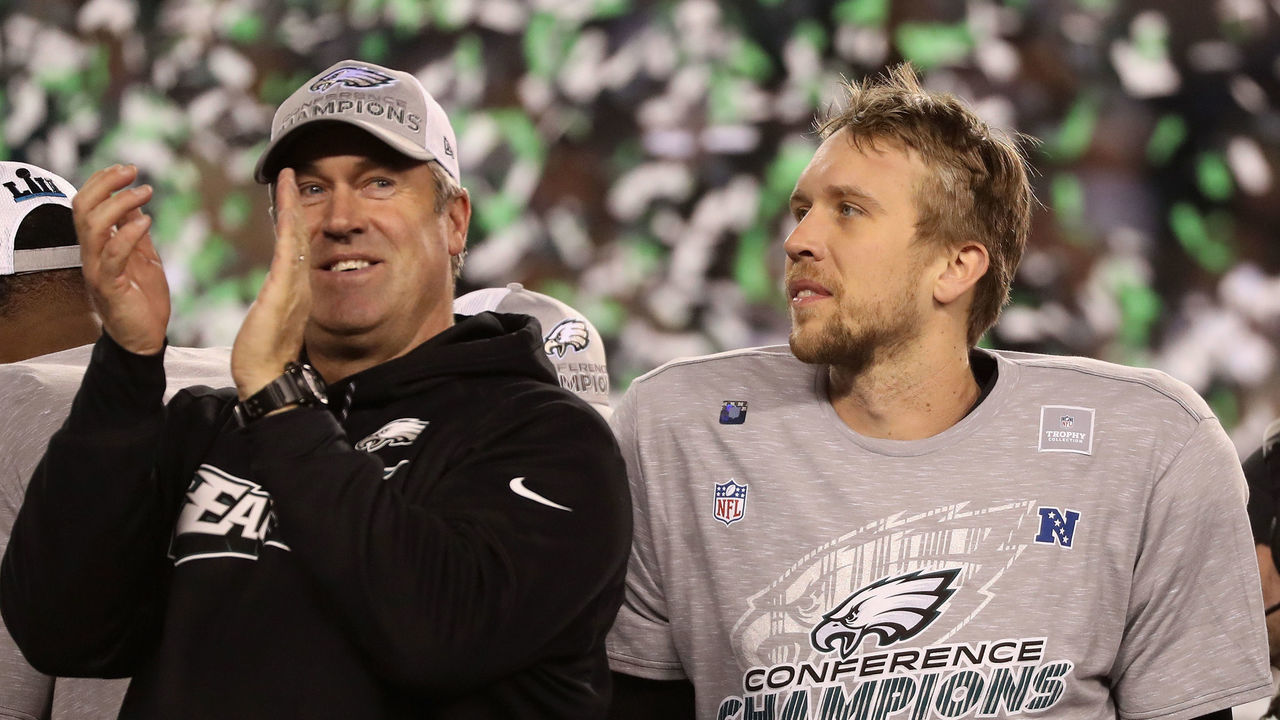 PHILADELPHIA, PA - JANUARY 21: Head coach Doug Pederson and Nick Foles #9 of the Philadelphia Eagles celebrate their teams win over the Minnesota Vikings in the NFC Championship game at Lincoln Financial Field on January 21, 2018 in Philadelphia, Pennsylvania. The Philadelphia Eagles defeated the Minnesota Vikings 38-7.