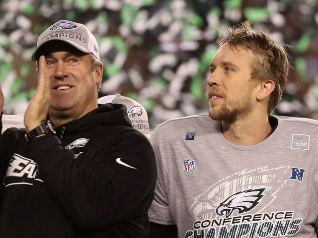 PHILADELPHIA, PA - JANUARY 21: Head coach Doug Pederson and Nick Foles #9 of the Philadelphia Eagles celebrate their teams win over the Minnesota Vikings in the NFC Championship game at Lincoln Financial Field on January 21, 2018 in Philadelphia, Pennsylvania. The Philadelphia Eagles defeated the Minnesota Vikings 38-7.