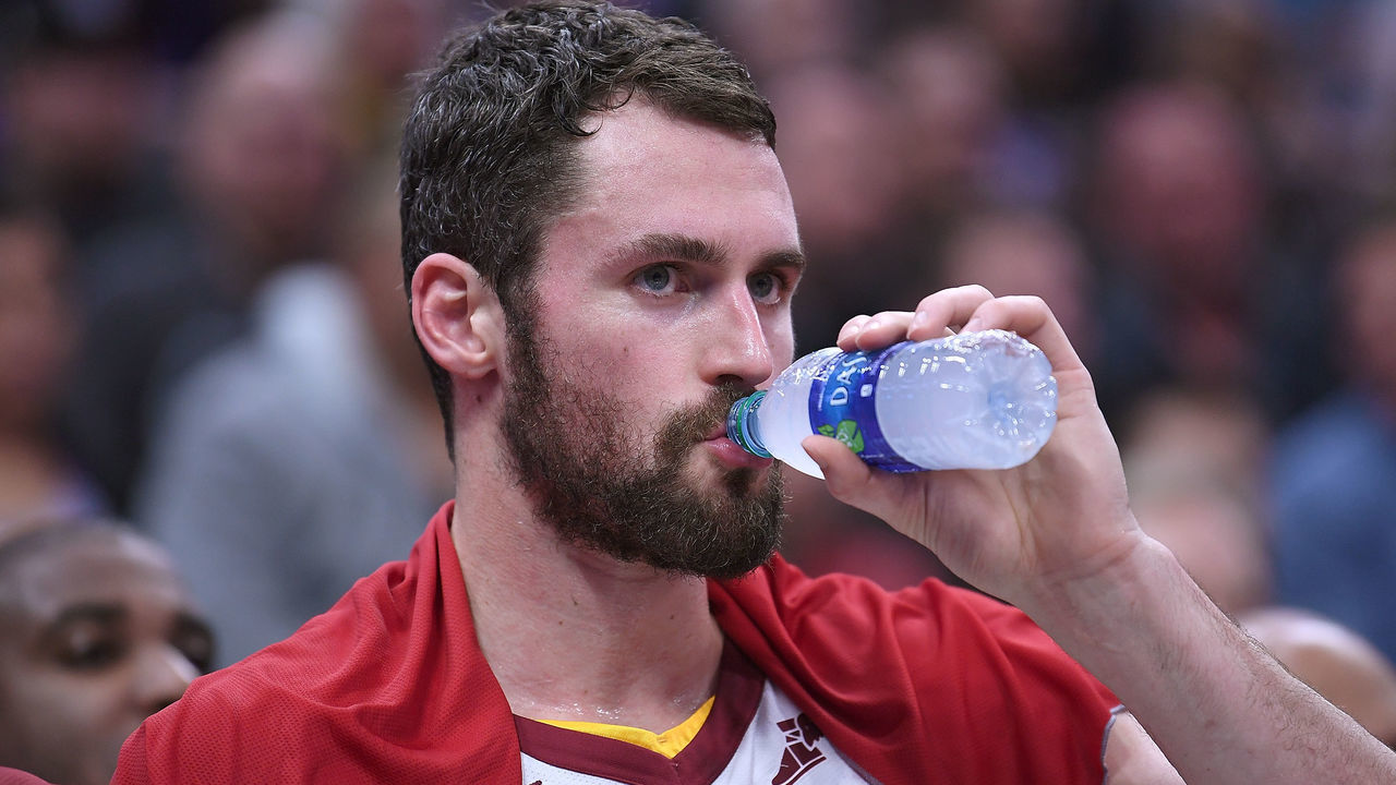SACRAMENTO, CA - DECEMBER 27: Kevin Love #0 of the Cleveland Cavaliers looks on from the bench against the Sacramento Kings during their NBA basketball game at Golden 1 Center on December 27, 2017 in Sacramento, California.