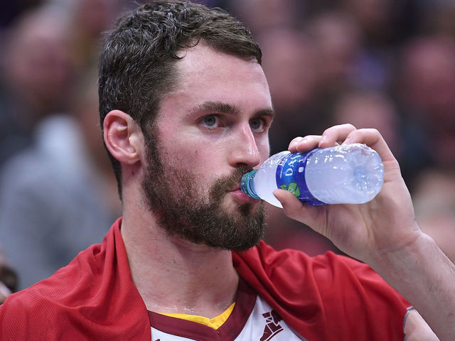 SACRAMENTO, CA - DECEMBER 27: Kevin Love #0 of the Cleveland Cavaliers looks on from the bench against the Sacramento Kings during their NBA basketball game at Golden 1 Center on December 27, 2017 in Sacramento, California.