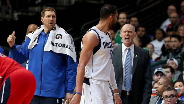 DALLAS, TX - JANUARY 22: Head coach Rick Carlisle of the Dallas Mavericks and Salah Mejri #50 of the Dallas Mavericks react after Salah Mejri #50 of the Dallas Mavericks is ejected from the game against the Washington Wizards at American Airlines Center on January 22, 2018 in Dallas, Texas.