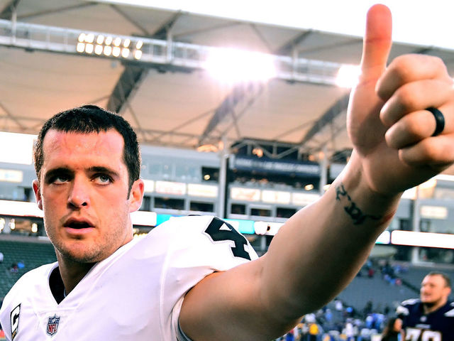 CARSON, CA - DECEMBER 31: Derek Carr #4 of the Oakland Raiders reacts as he leaves the field after 30-10 loss to the Los Angeles Chargers at StubHub Center on December 31, 2017 in Carson, California.