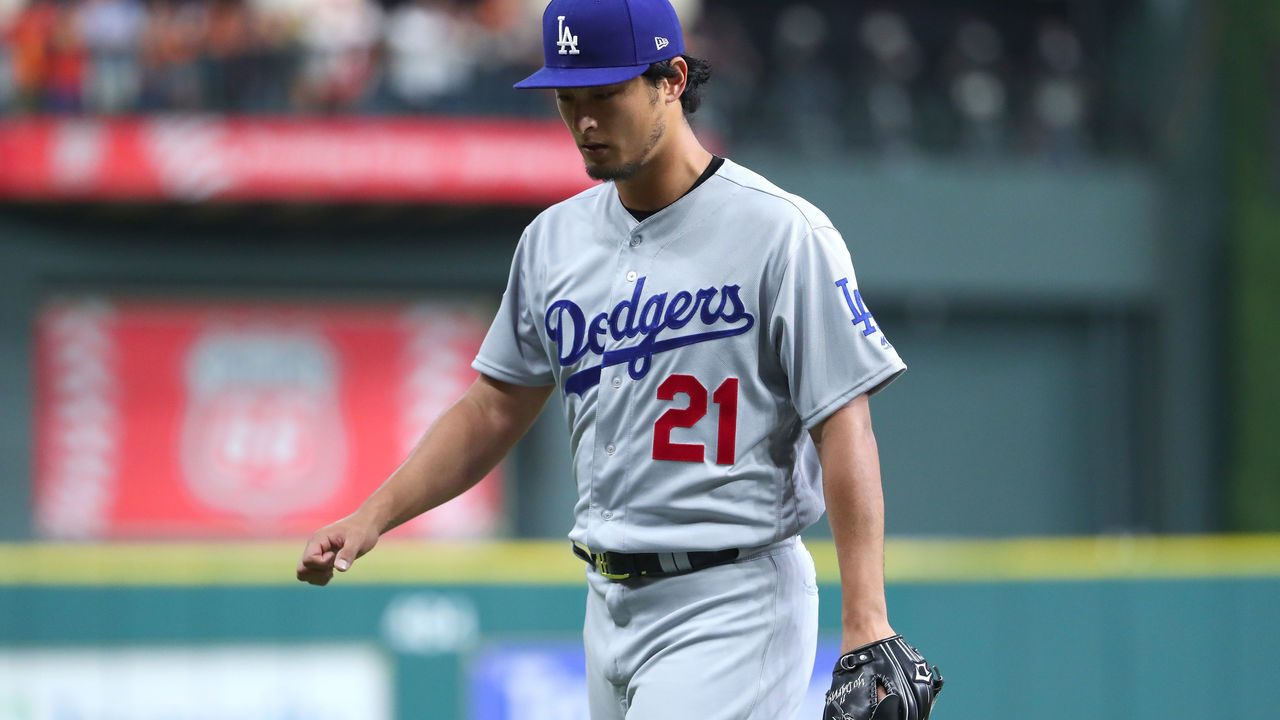 HOUSTON, TX - OCTOBER 27: Yu Darvish #21 of the Los Angeles Dodgers looks on during the first inning against the Houston Astros in game three of the 2017 World Series at Minute Maid Park on October 27, 2017 in Houston, Texas.