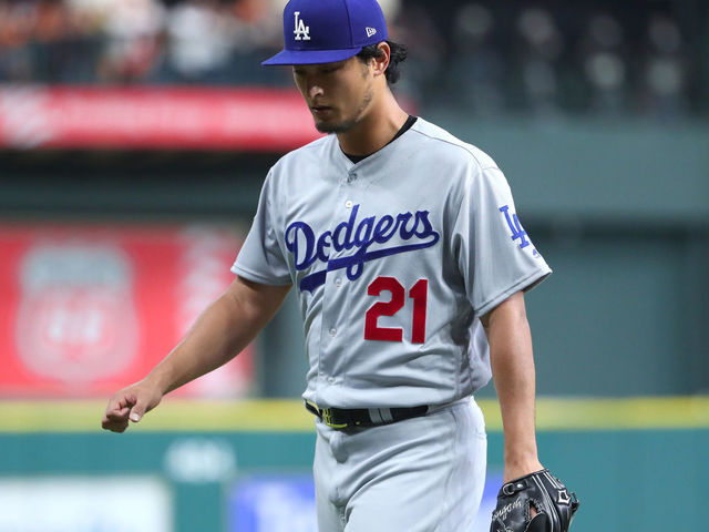 HOUSTON, TX - OCTOBER 27: Yu Darvish #21 of the Los Angeles Dodgers looks on during the first inning against the Houston Astros in game three of the 2017 World Series at Minute Maid Park on October 27, 2017 in Houston, Texas.