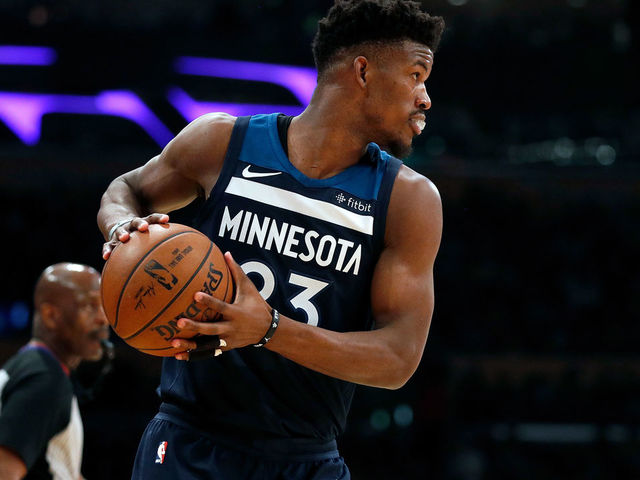 LOS ANGELES, CA - DECEMBER 25: Jimmy Butler #23 of the Minnesota Timberwolves looks to pass the ball during the first half of the game against the Los Angeles Lakers at the Staples Center on December 25, 2017 in Los Angeles, California.