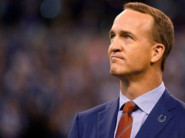 INDIANAPOLIS, IN - OCTOBER 08: Peyton Manning watches a video presentation during a ceremony to retire his number during the halftime of the game between the Indianapolis Colts and the San Francisco 49ers at Lucas Oil Stadium on October 8, 2017 in Indianapolis, Indiana.