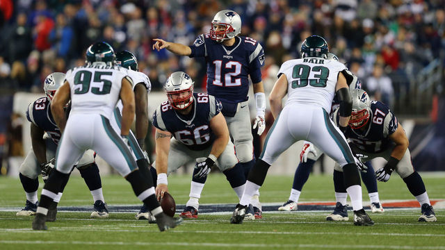 FOXBORO, MA - DECEMBER 06: Tom Brady #12 of the New England Patriots communicates at the line of scrimmage during the game against the Philadelphia Eagles at Gillette Stadium on December 6, 2015 in Foxboro, Massachusetts.