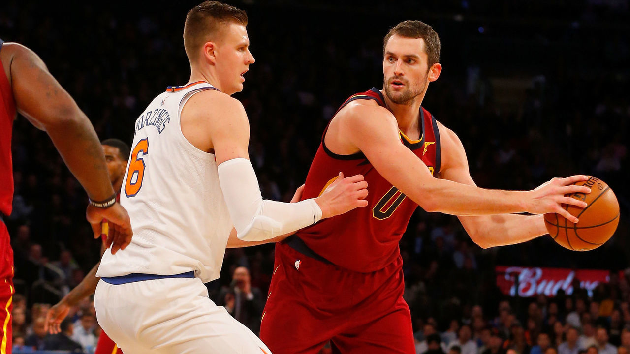 NEW YORK, NY - NOVEMBER 13: (NEW YORK DAILIES OUT) Kristaps Porzingis #6 of the New York Knicks defends against Kevin Love #0 of the Cleveland Cavaliers at Madison Square Garden on November 13, 2017 in New York City. The Cavaliers defeated the Knicks 104-101. NOTE TO USER: User expressly acknowledges and agrees that, by downloading and/or using this Photograph, user is consenting to the terms and conditions of the Getty Images License Agreement.