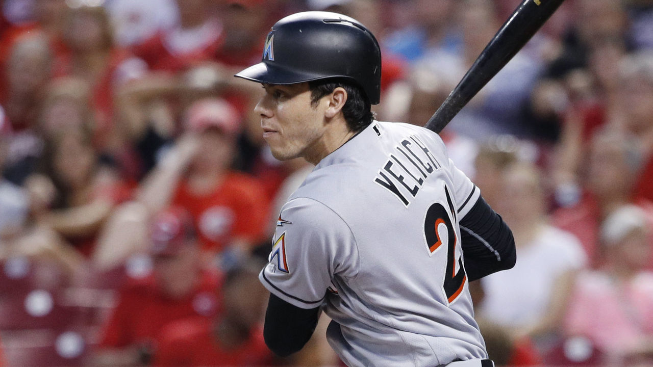 CINCINNATI, OH - JULY 21: Christian Yelich #21 of the Miami Marlins grounds out to second base to drive in a run in the first inning of a game against the Cincinnati Reds at Great American Ball Park on July 21, 2017 in Cincinnati, Ohio.
