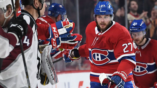 MONTREAL, QC - JANUARY 23: Alex Galchenyuk #27 of the Montreal Canadiens celebrates with the bench after scoring a goal against of the Colorado Avalanche in the NHL game at the Bell Centre on January 23, 2018 in Montreal, Quebec, Canada.