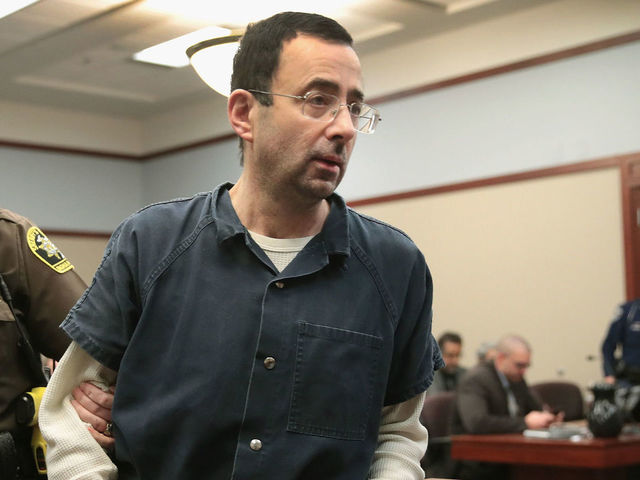 LANSING, MI - JANUARY 17: Larry Nassar appears in court to listen to victim impact statements during his sentencing hearing after being accused of molesting more than 100 girls while he was a physician for USA Gymnastics and Michigan State University where he had his sports-medicine practice on January 17, 2018 in Lansing, Michigan. Nassar has pleaded guilty in Ingham County, Michigan, to sexually assaulting seven girls, but the judge is allowing all his accusers to speak. Nassar is currently serving a 60-year sentence in federal prison for possession of child pornography.