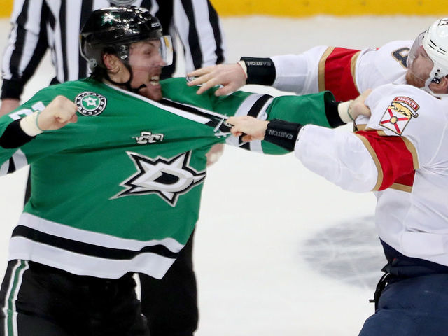 DALLAS, TX - JANUARY 23: Brett Ritchie #25 of the Dallas Stars fights with Connor Brickley #23 of the Florida Panthers in the third period at American Airlines Center on January 23, 2018 in Dallas, Texas.