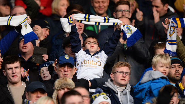 LEEDS, ENGLAND - JANUARY 20: A young Leeds United fan sings during the Sky Bet Championship match between Leeds United and Millwall at Elland Road on January 20, 2018 in Leeds, England.