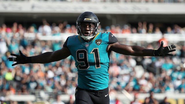 JACKSONVILLE, FL - NOVEMBER 05: Yannick Ngakoue #91 of the Jacksonville Jaguars celebrates a play on the field in the second half of their game against the Cincinnati Bengals at EverBank Field on November 5, 2017 in Jacksonville, Florida.