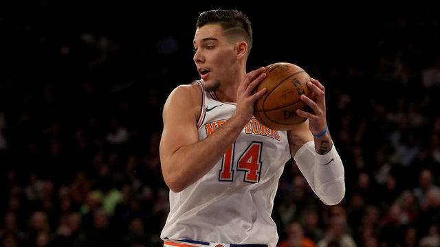NEW YORK, NEW YORK - JANUARY 02: Willy Hernangomez #14 of the New York Knicks grabs the rebound in the second half against the San Antonio Spurs at Madison Square Garden on January 02, 2018 in New York City.