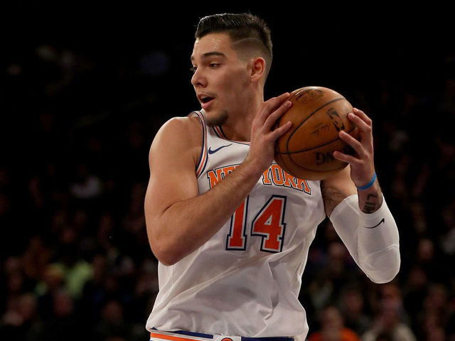 NEW YORK, NEW YORK - JANUARY 02: Willy Hernangomez #14 of the New York Knicks grabs the rebound in the second half against the San Antonio Spurs at Madison Square Garden on January 02, 2018 in New York City.