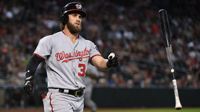 PHOENIX, AZ - JULY 23: Bryce Harper #34 of the Washington Nationals throws his bat after lining out to center field against the Arizona Diamondbacks during the ninth inning at Chase Field on July 23, 2017 in Phoenix, Arizona. Nationals won 6-2.